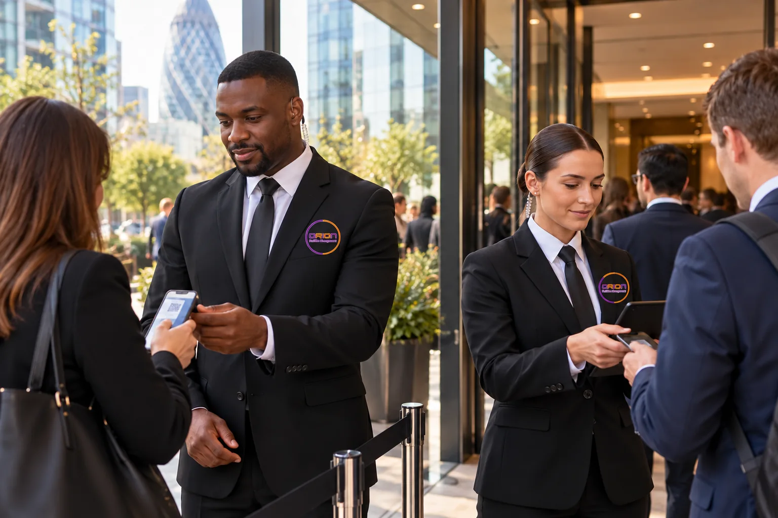 Illustrative security staff in black suits, white shirts and black ties at a business event
